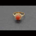 Anillo oro amarillo 18k con coral rodeado de circonitas nº 19