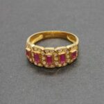 Anillo oro amarillo 18 qt nº 17,5 con circonitas corintas y blancas