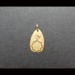 Medalla oro amarillo 18k imagen de ángel con reloj