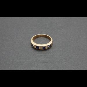 Anillo oro amarillo 18k con piedras azules y 3 brillantes de 0,1qte cada uno total, 0,3qtes nº 13,5