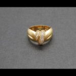 Anillo oro amarillo 18k con formas onduladas decorado con circonitas nº 15