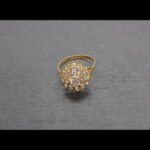 Anillo oro amarillo 18k nº 17 formando roseta con circonitas blancas