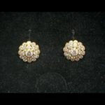 Pendientes oro amarillo 18k formando roseta con circonitas blancas