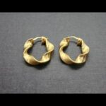 Argollas oro amarillo 18k forma rizada