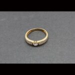 Anillo oro amarillo 18k con circonitas blancas nº 16
