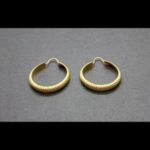 Argollas oro amarillo 18k forma rayón