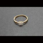 Anillo oro amarillo 18k tipo solitario con 4 brillantes de 0,06qtes cada uno,total 0,24qtes nº 21