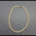 Pulsera oro amarillo 18k eslabón tipo barbada con barra 19 cm