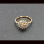 Anillo oro amarillo 18k con roseta de circonitas nº 16,5