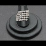 Anillo ancho oro blanco 18 k nº 16 con multiples filas de circonitas blancas