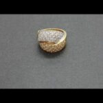 Anillo oro amarillo y blanco 18k con forma entrelazada cuajado de circonitas nº 14