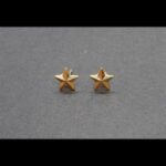 Pendientes oro amarillo 18k con forma de estrella con circonita, cierre de mariposa