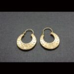 Argollas oro amarillo 18k con diseño tallado
