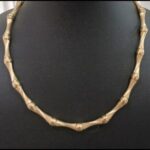 Gargantilla oro amarillo 18k de 45 cm de eslabones con diseño bambú pulidos en brillo y satinado