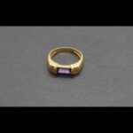 Anillo oro amarillo 18k con piedra de color lila nº 16