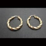 Argollas oro amarillo 18k forma rizadas