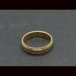 Alianza oro amarillo y blanco 18k con dibujos en forma de X nº 14,5